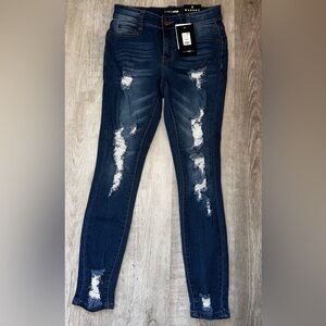 Fashion nova Reagan mid rise jeans size 3 medium blue wash